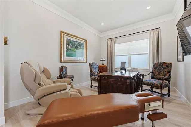a spacious bathroom with a double vanity sink a large mirror and shower