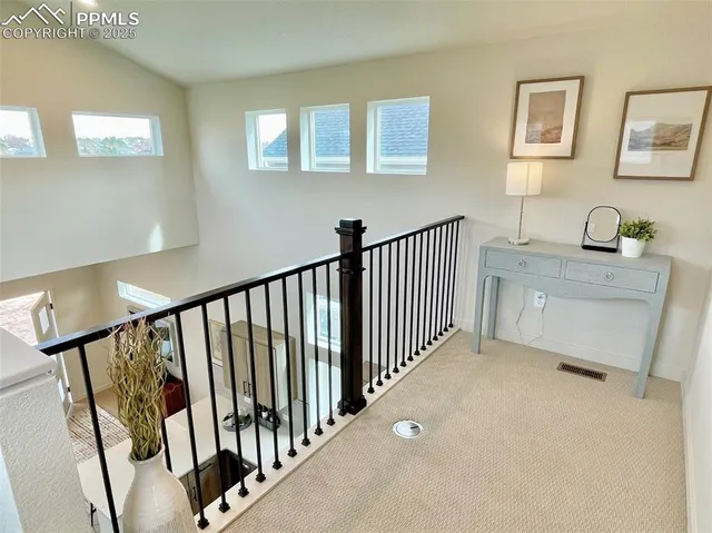 a bathroom with a sink a toilet a mirror and shower