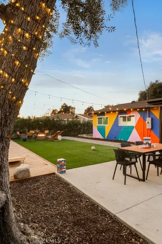 a view of an outdoor space with furniture