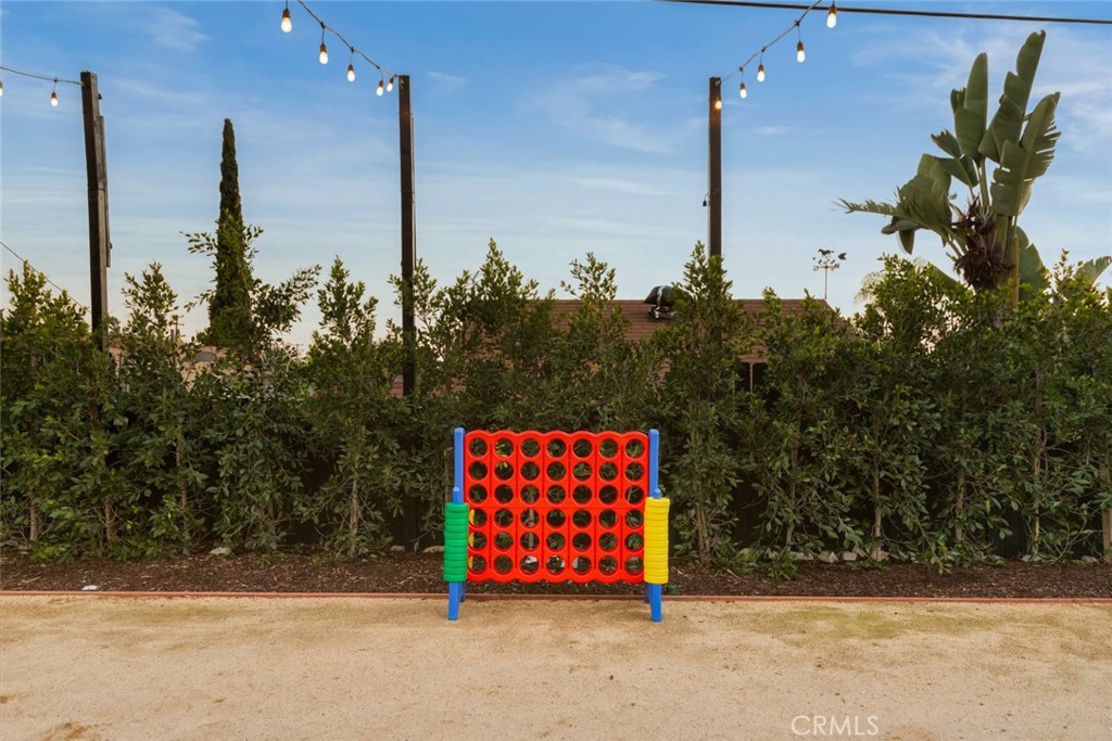 4555 Oakdale Street Montclair, CA 91763 - Photo 19 of 39 a view of a street with potted plants