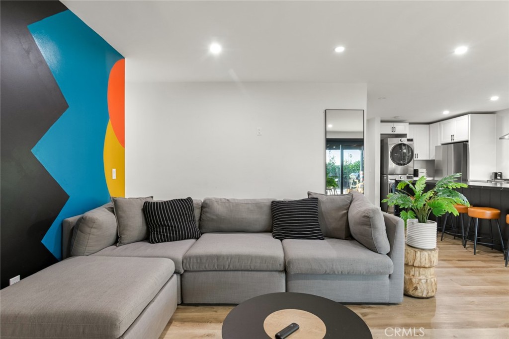 4555 Oakdale Street Montclair, CA 91763 - Photo 29 of 39 a living room with furniture potted plant and a window