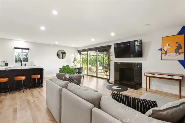 a bathroom with a sink a mirror and vanity