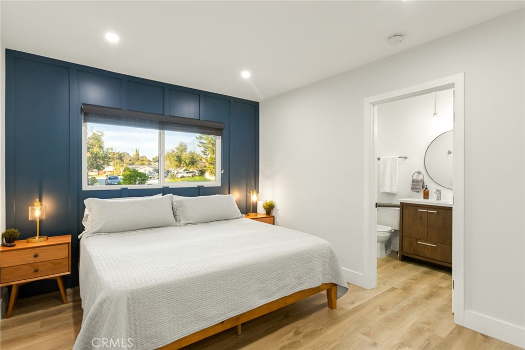 4555 Oakdale Street Montclair, CA 91763 - Photo 36 of 39 a bedroom with a large bed and a window