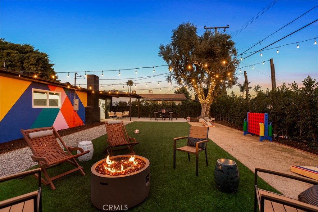 4555 Oakdale Street Montclair, CA 91763 - Photo 9 of 39 a view of a chairs and tables in the patio