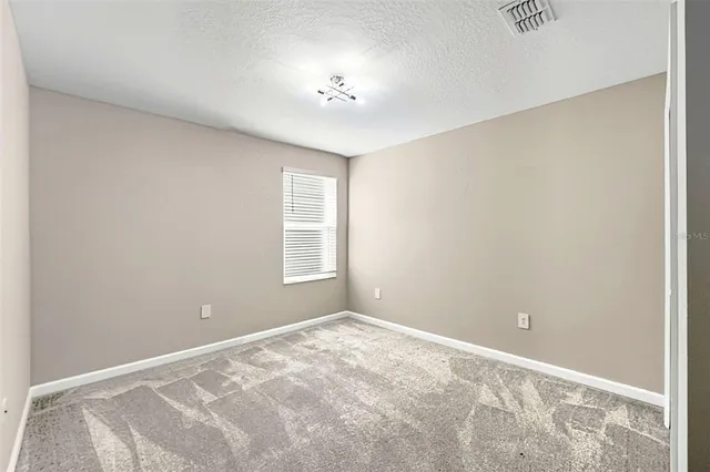 a view of a room with a wardrobe space