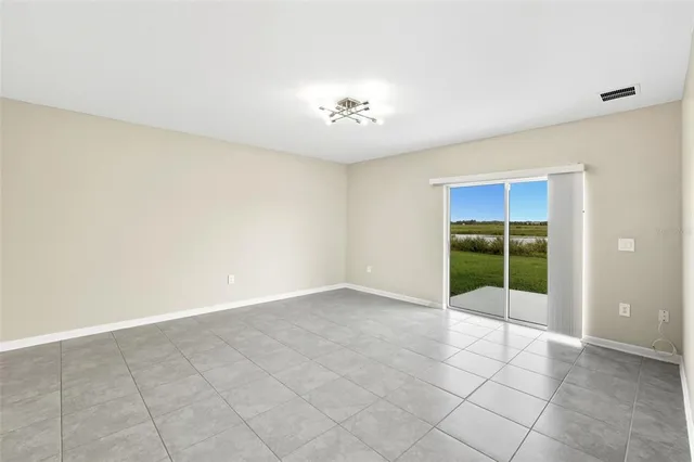 an empty room with a bathroom