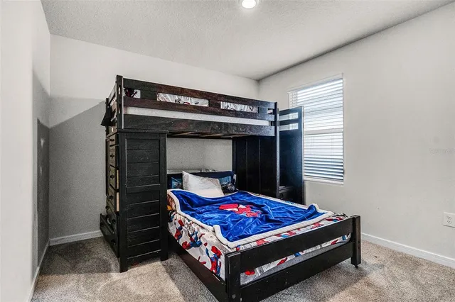 a room with a bed and a table