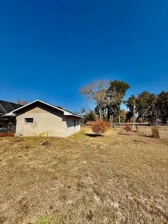 a view of house with a outdoor space