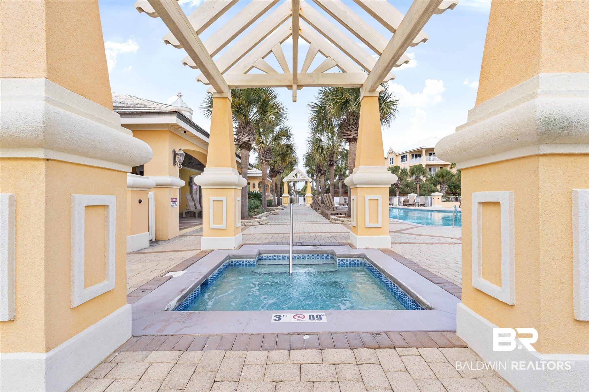 9259 Genipa Way Gulf Shores, AL 36542 - Photo 47 of 72 View of swimming pool featuring a hot tub and a patio