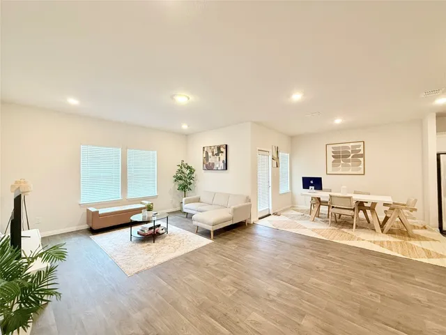 a living room with furniture and a couch