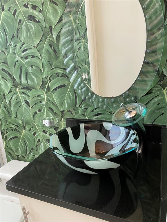 1522 Gulf Boulevard Indian Rocks Beach, FL 33785 - Photo 25 of 52 a close view of dining table