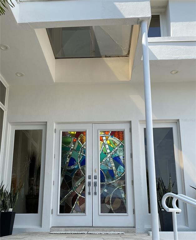 1522 Gulf Boulevard Indian Rocks Beach, FL 33785 - Photo 4 of 52 a view of a entryway of the house