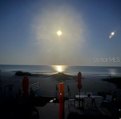 1522 Gulf Boulevard Indian Rocks Beach, FL 33785 - Photo 52 of 52 a room with furniture and a lamp