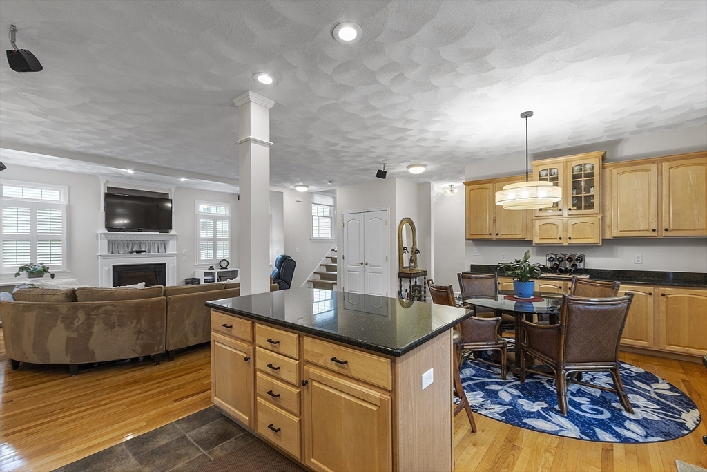 820 Main Street, Unit 1 Wakefield, MA 01880 - Photo 18 of 36 a kitchen with sink a table and chairs