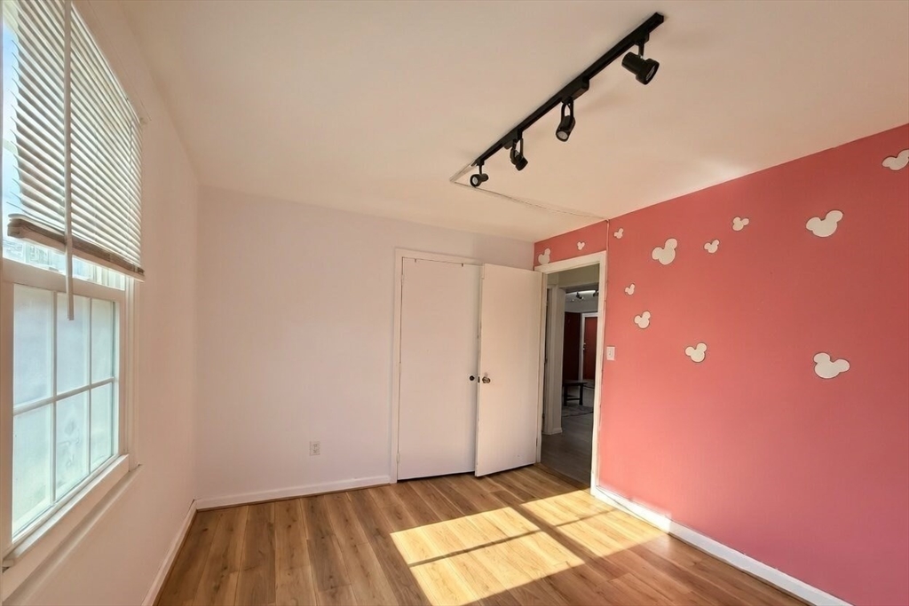 180 Tyngsboro Road, Unit 17A Chelmsford, MA 01863 - Photo 7 of 10 a view of entryway with stairs