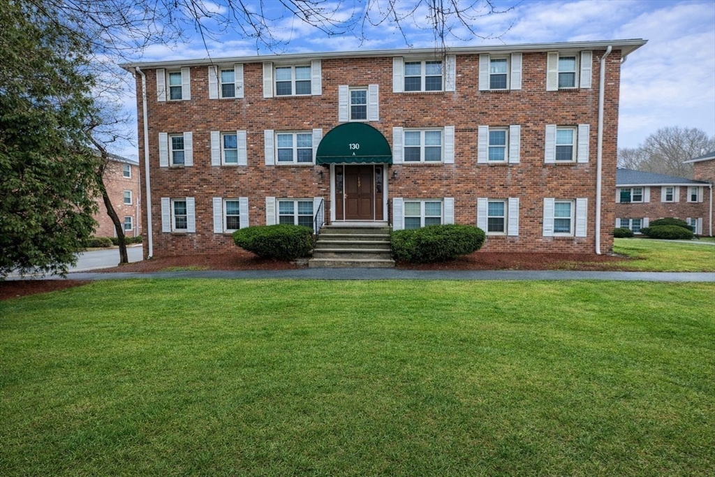 180 Tyngsboro Road, Unit 17A Chelmsford, MA 01863 - Photo 9 of 10 a front view of a house