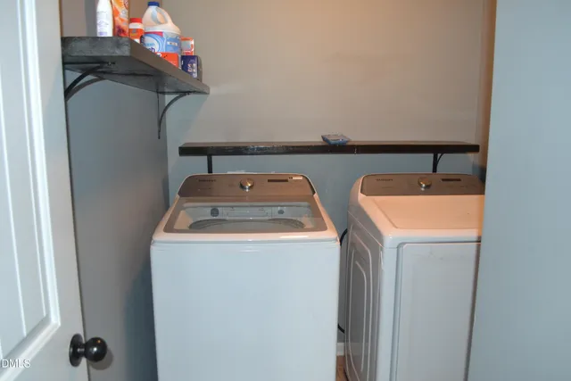 a picture of a bathroom with a shower