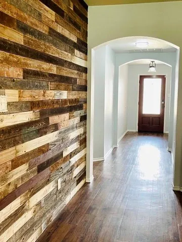 a view of front door and bedroom