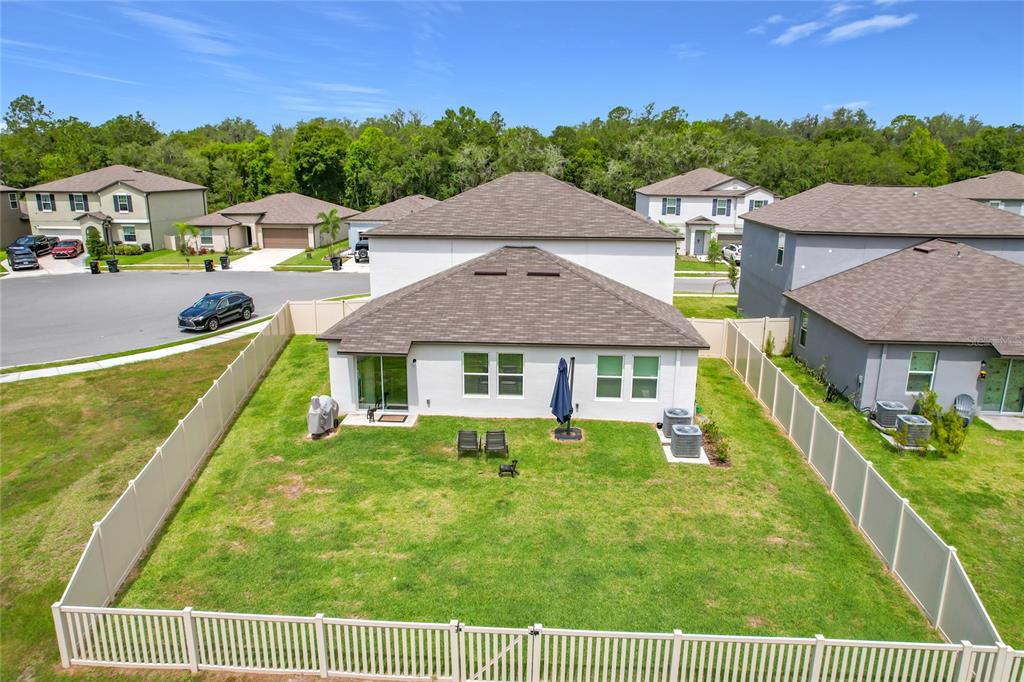 1633 Red Loop Lakeland, FL 33801 - Photo 47 of 60 a view of a house with a yard