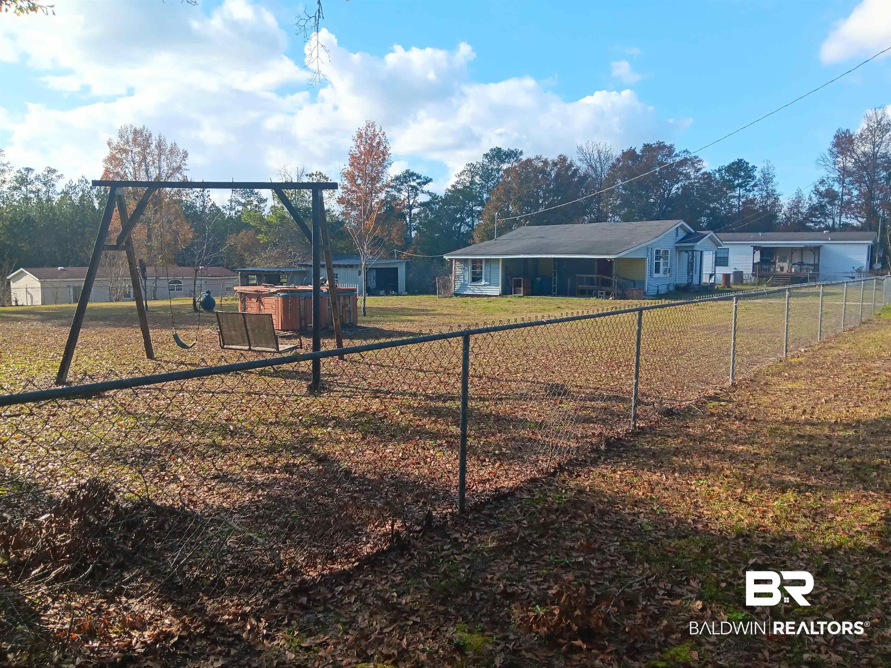 61 Katherine Street Flomaton, AL 36441 - Photo 12 of 13 View of yard featuring a playground