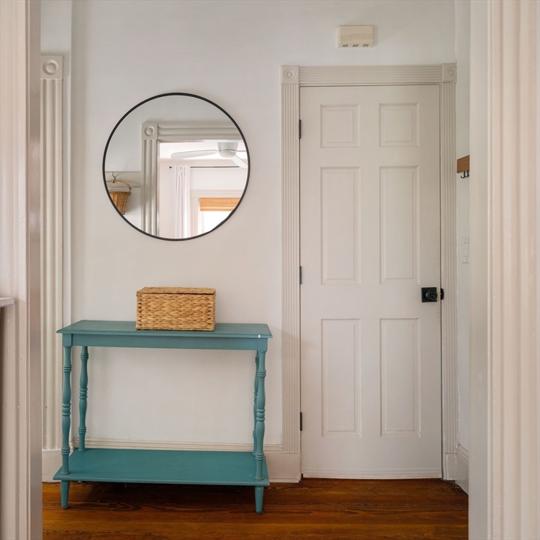 52 Victoria Street, Unit B Somerville, MA 02144 - Photo 18 of 32 a front view of a house with a wooden door