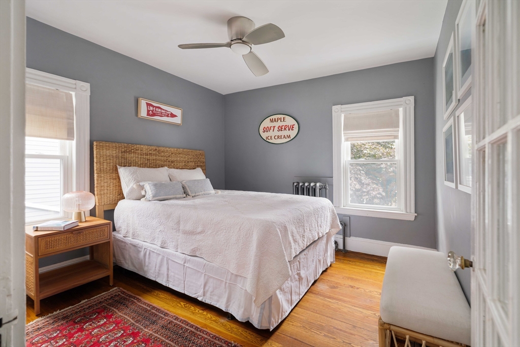 52 Victoria Street, Unit B Somerville, MA 02144 - Photo 19 of 32 a bedroom with a bed and a window