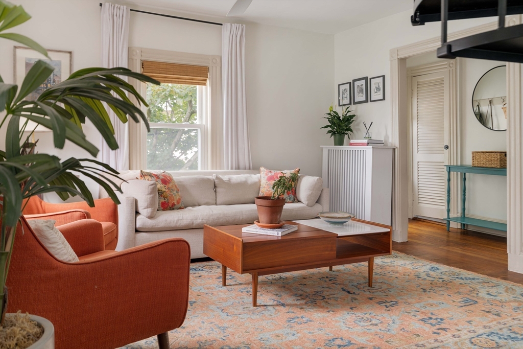 52 Victoria Street, Unit B Somerville, MA 02144 - Photo 2 of 32 a living room with furniture and a window
