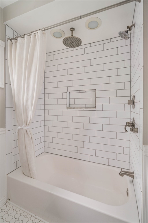 52 Victoria Street, Unit B Somerville, MA 02144 - Photo 22 of 32 a bathroom with a shower and a bathtub