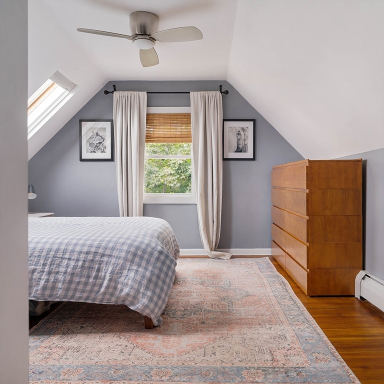 52 Victoria Street, Unit B Somerville, MA 02144 - Photo 25 of 32 a bedroom with a large bed and a window