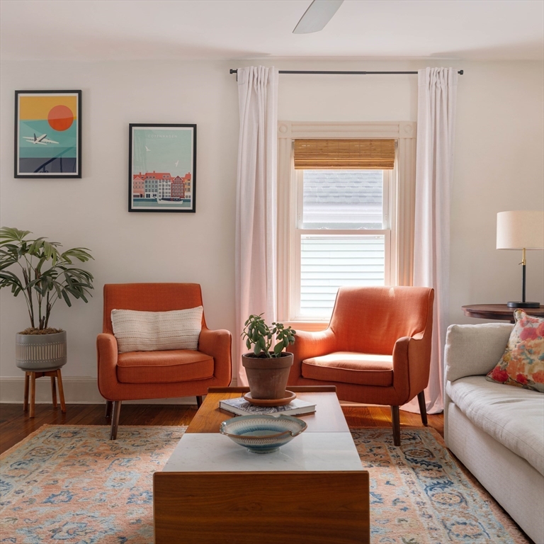 52 Victoria Street, Unit B Somerville, MA 02144 - Photo 3 of 32 a living room with furniture and a potted plant
