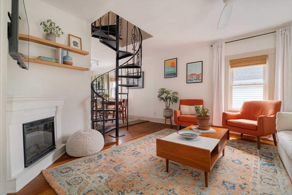 52 Victoria Street, Unit B Somerville, MA 02144 - Photo 5 of 32 a living room with furniture a rug and a window