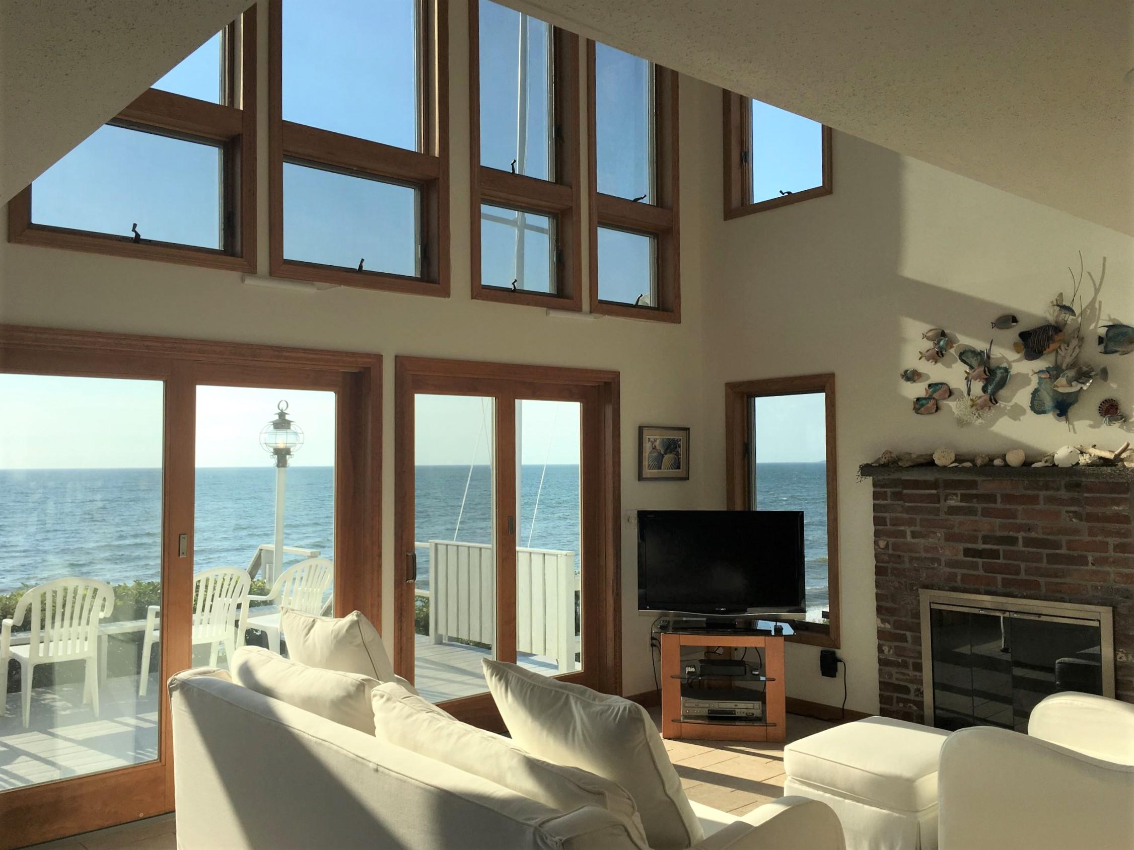 29 Bayberry Lane Eastham, MA 02642 - Photo 15 of 35 a living room with fireplace furniture and a flat screen tv