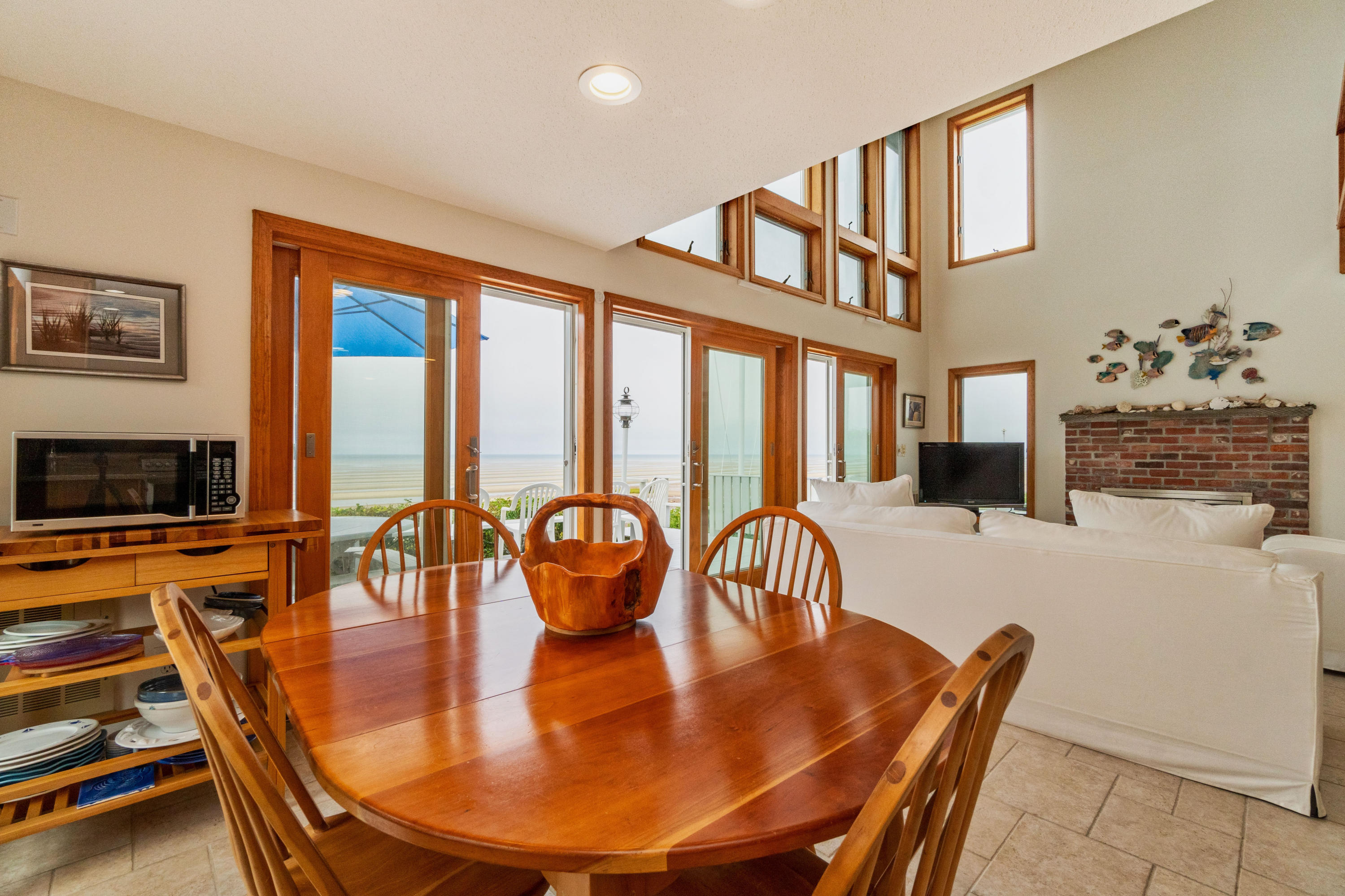 29 Bayberry Lane Eastham, MA 02642 - Photo 19 of 35 a dining room with furniture and wooden floor