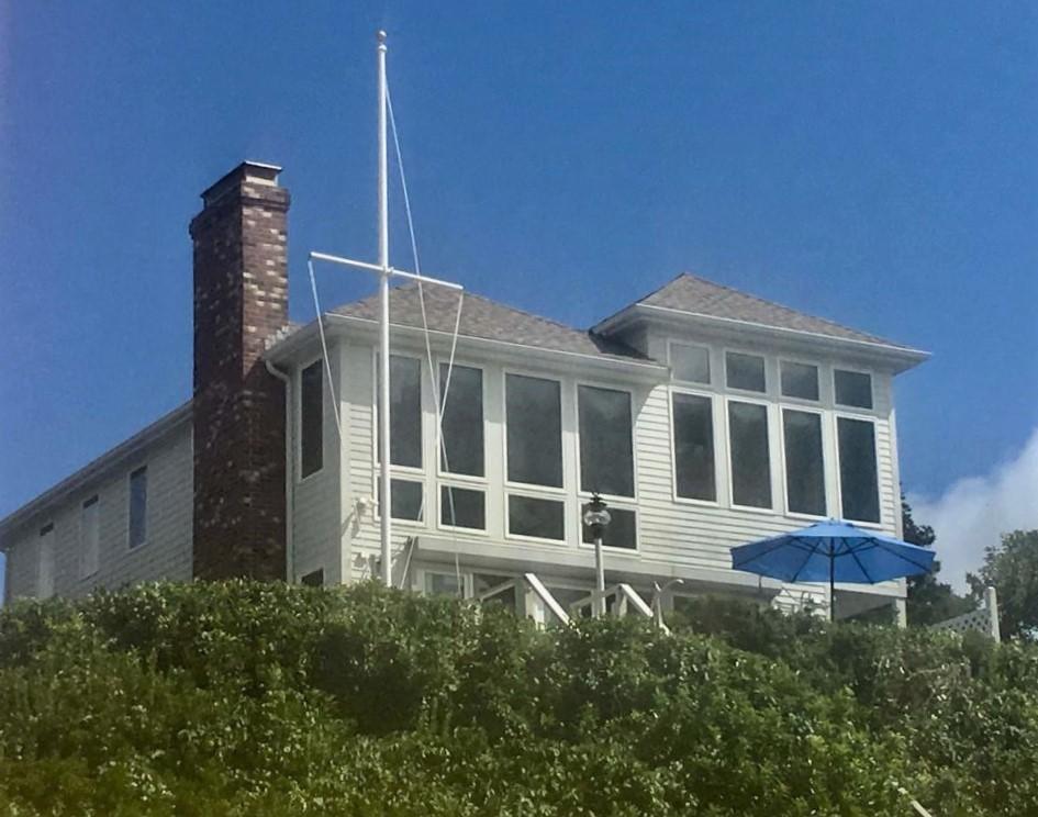 29 Bayberry Lane Eastham, MA 02642 - Photo 2 of 35 a house view with a garden space