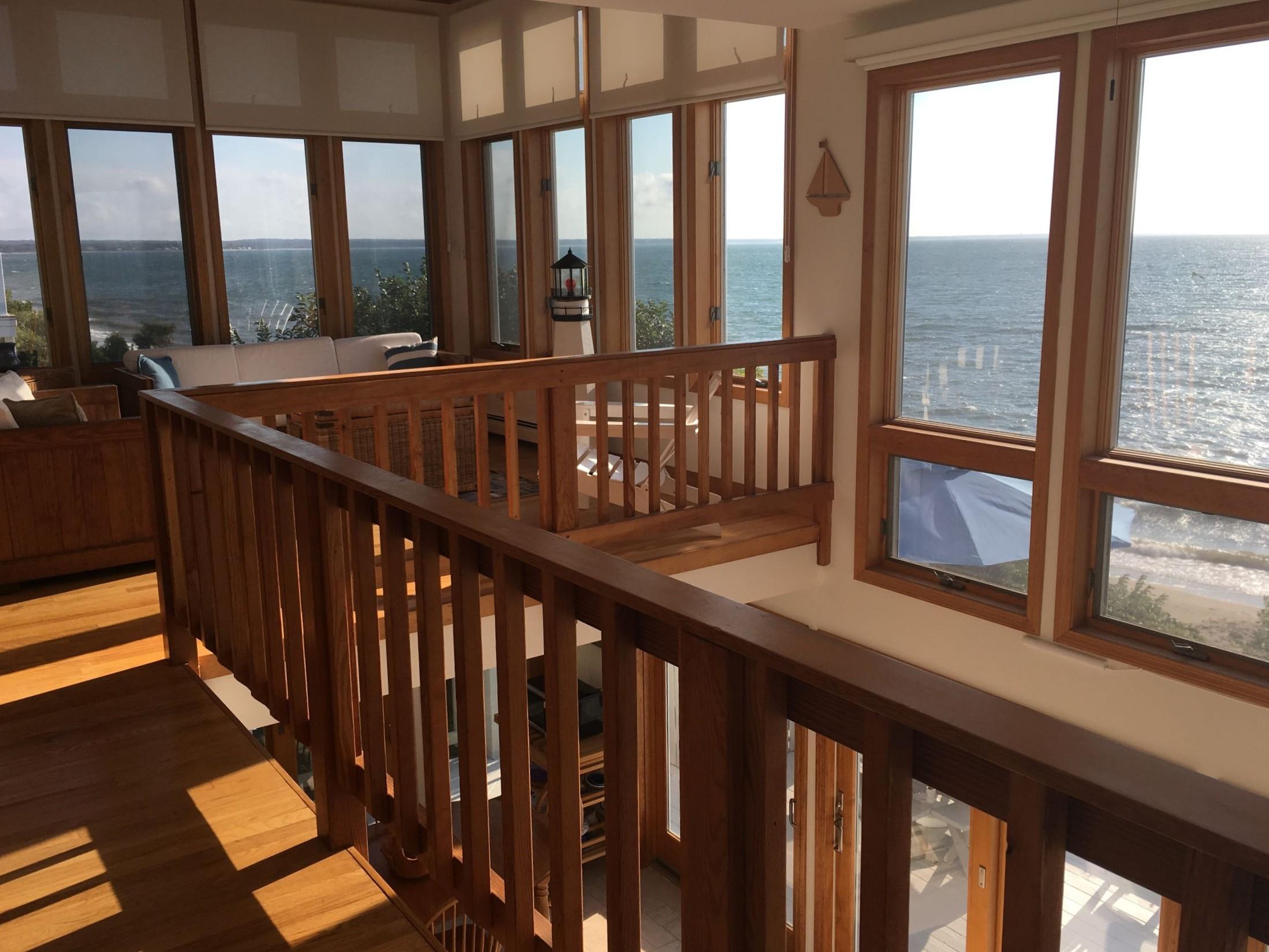 29 Bayberry Lane Eastham, MA 02642 - Photo 24 of 35 a view of a porch with wooden floor of stairs