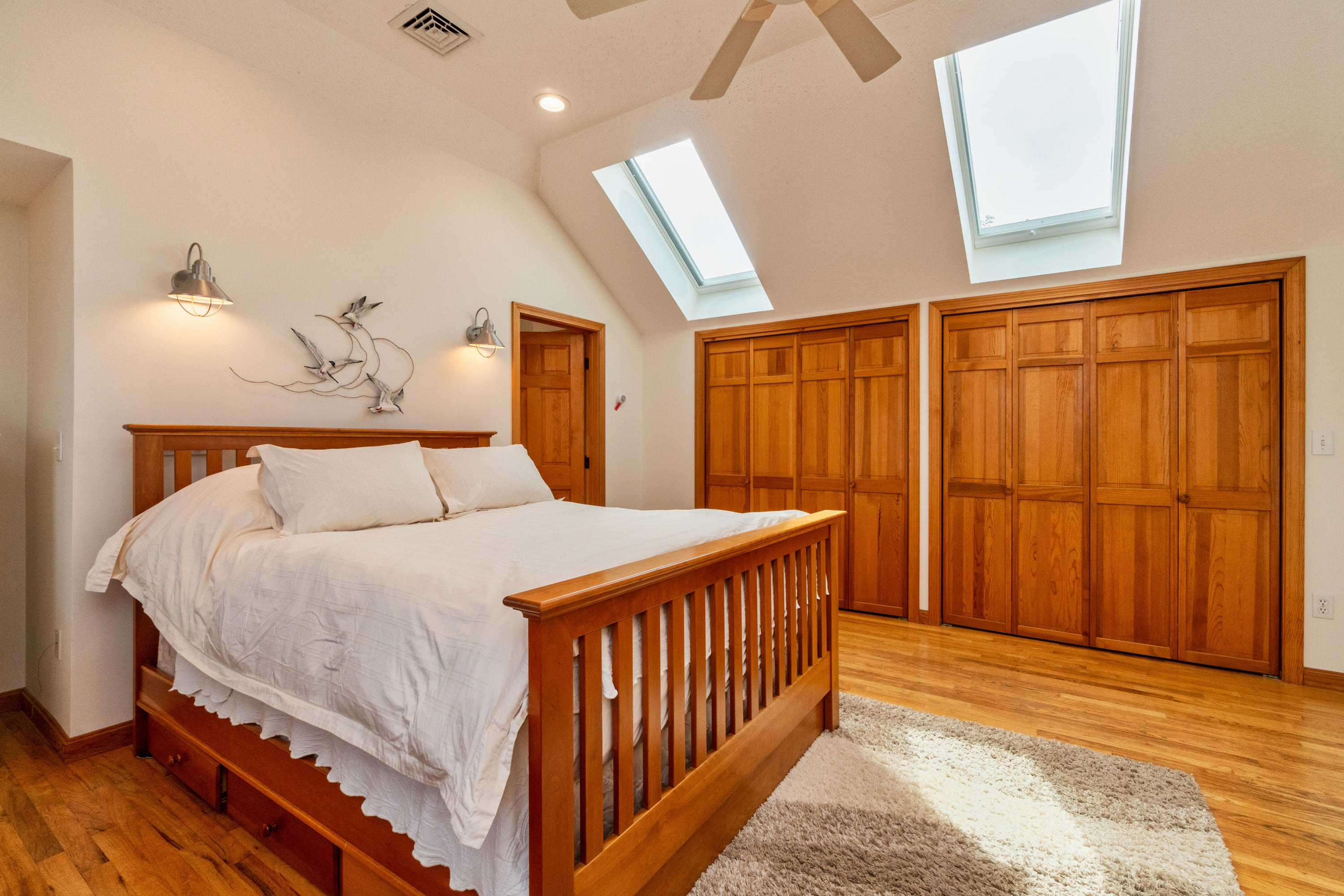 29 Bayberry Lane Eastham, MA 02642 - Photo 28 of 35 a bedroom with a bed and a window