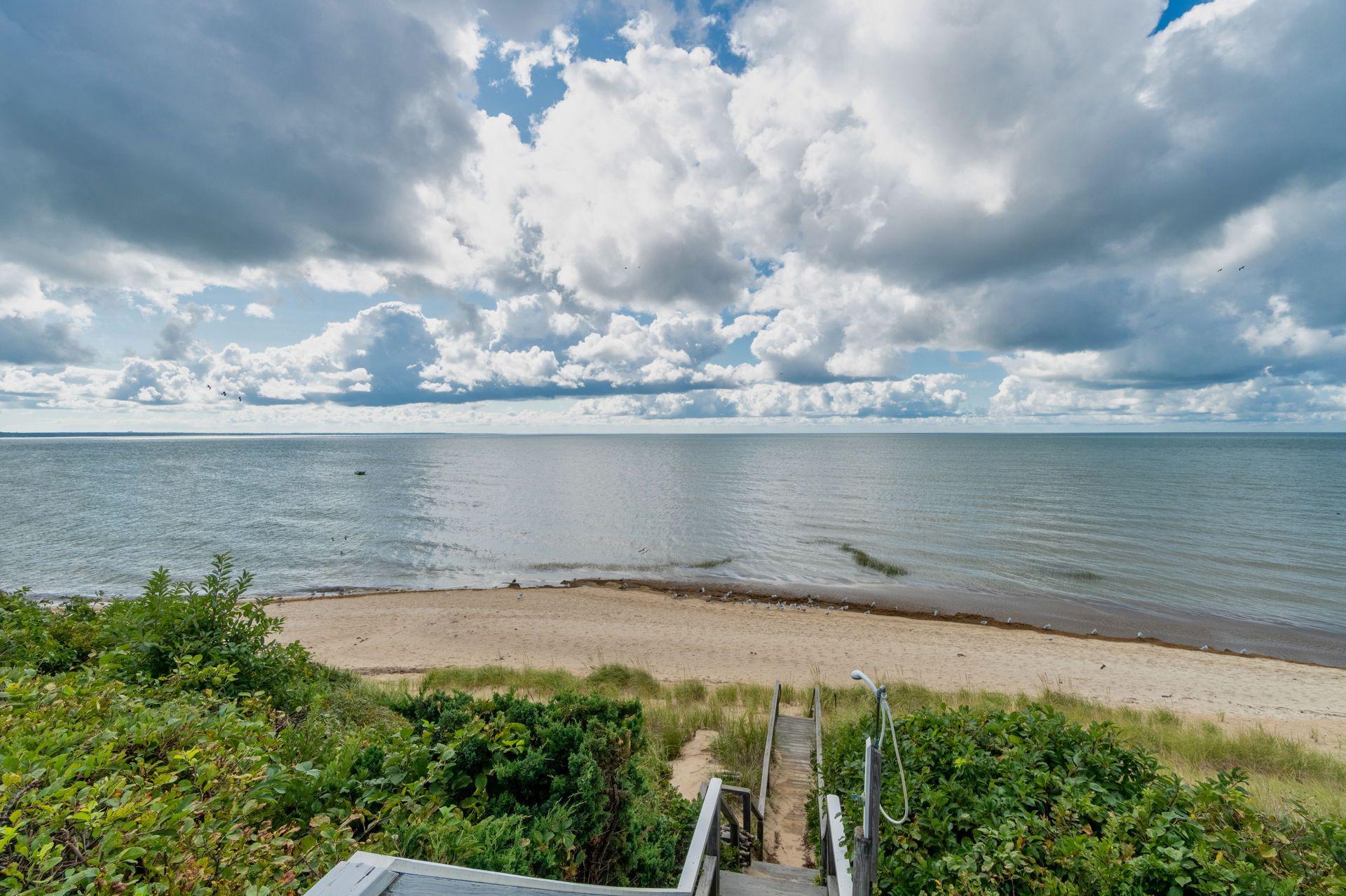 29 Bayberry Lane Eastham, MA 02642 - Photo 3 of 35 a view of a lake with a lake