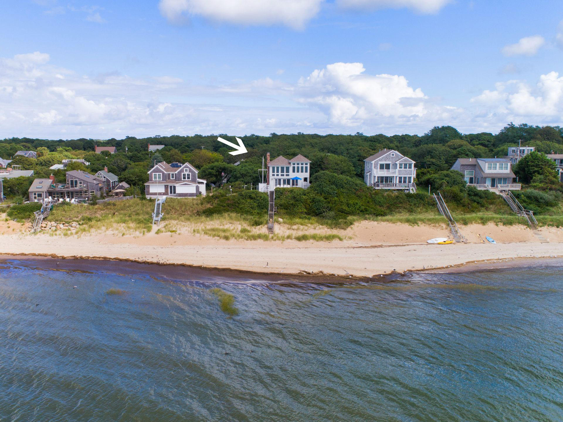 29 Bayberry Lane Eastham, MA 02642 - Photo 5 of 35 a front view of a house with a yard