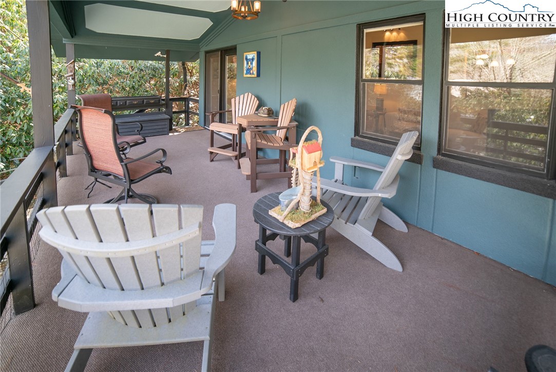 10 Locust Road Newland, NC 28657 - Photo 2 of 36 a living room with furniture and a large window