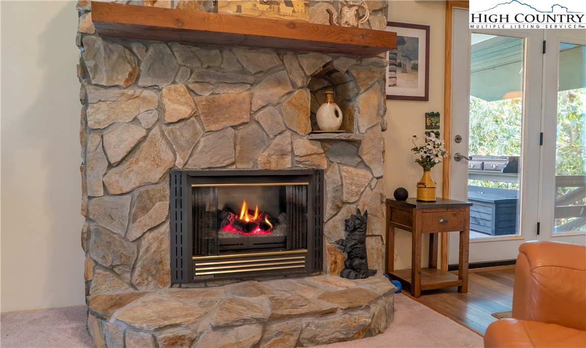 10 Locust Road Newland, NC 28657 - Photo 8 of 36 a living room with furniture and a fireplace