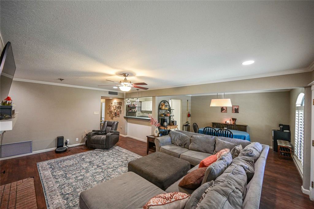 32 Rue Maison Abilene, TX 79605 - Photo 6 of 40 a living room with furniture and wooden floor