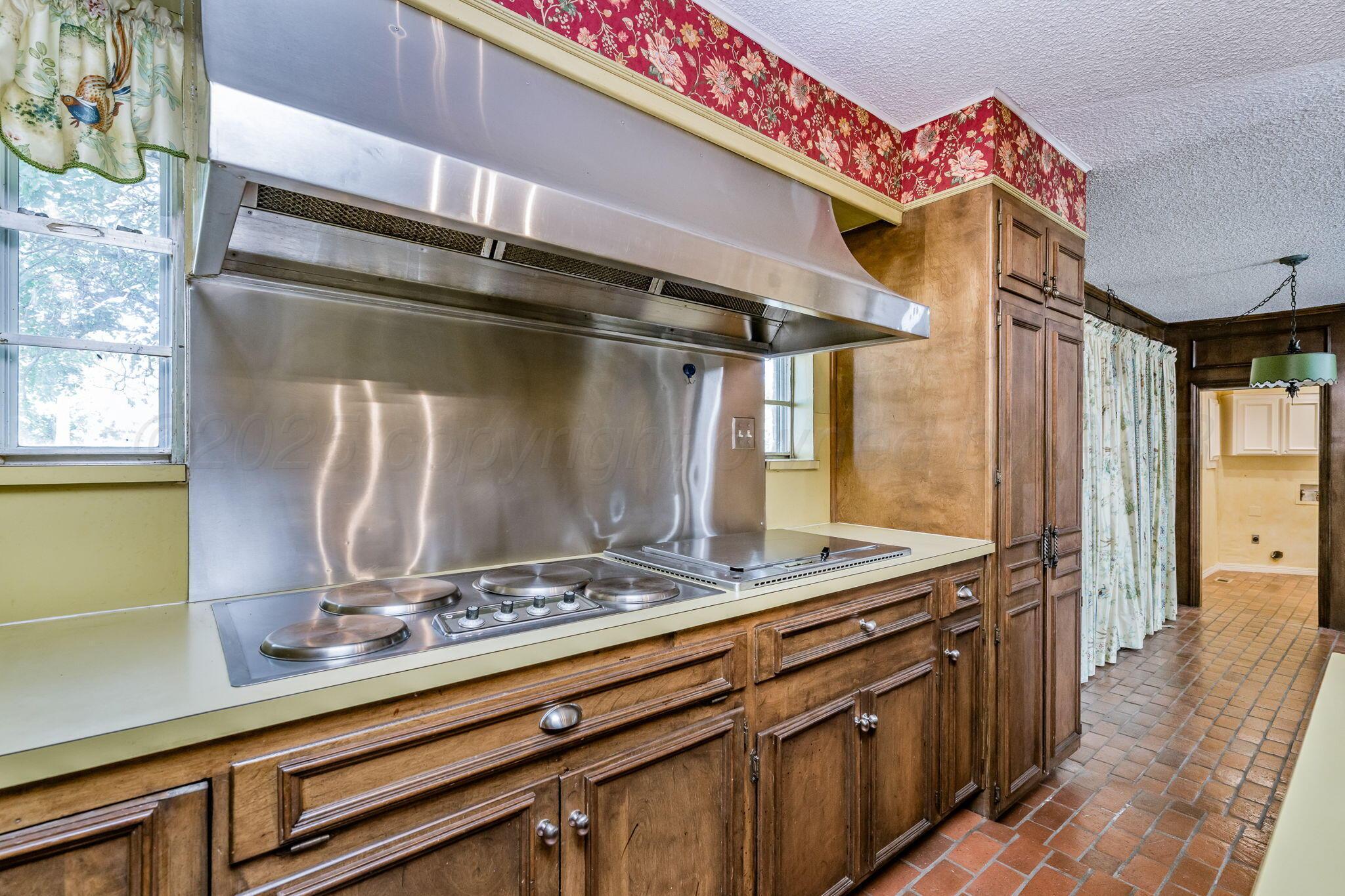 112 Western Street Claude, TX 79019 - Photo 17 of 41 a kitchen with a sink and cabinets