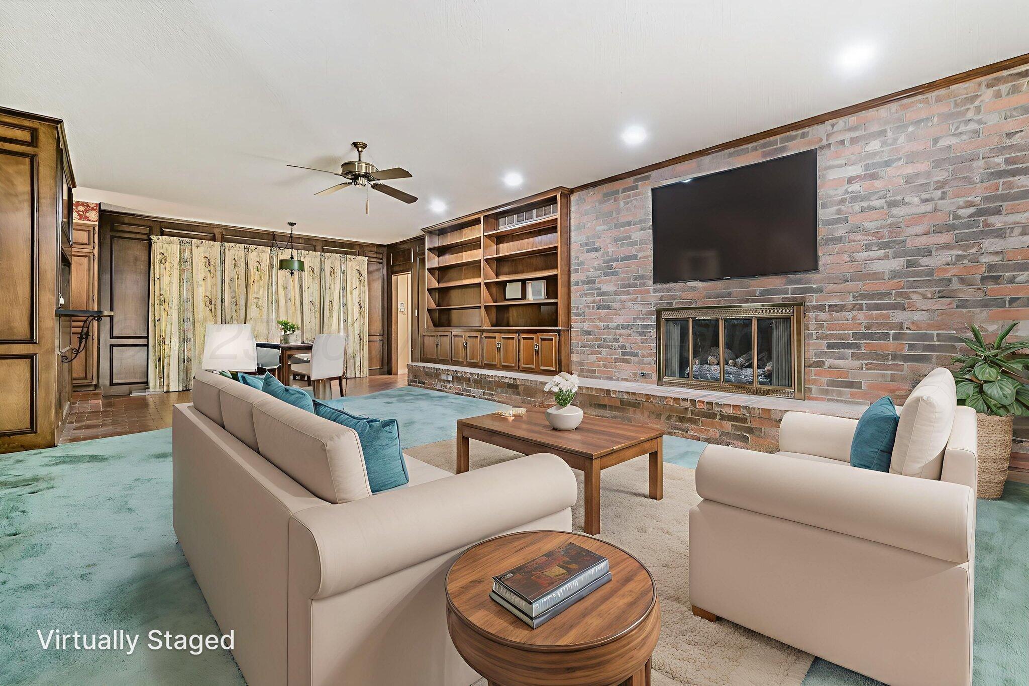 112 Western Street Claude, TX 79019 - Photo 21 of 41 a living room with furniture and a flat screen tv