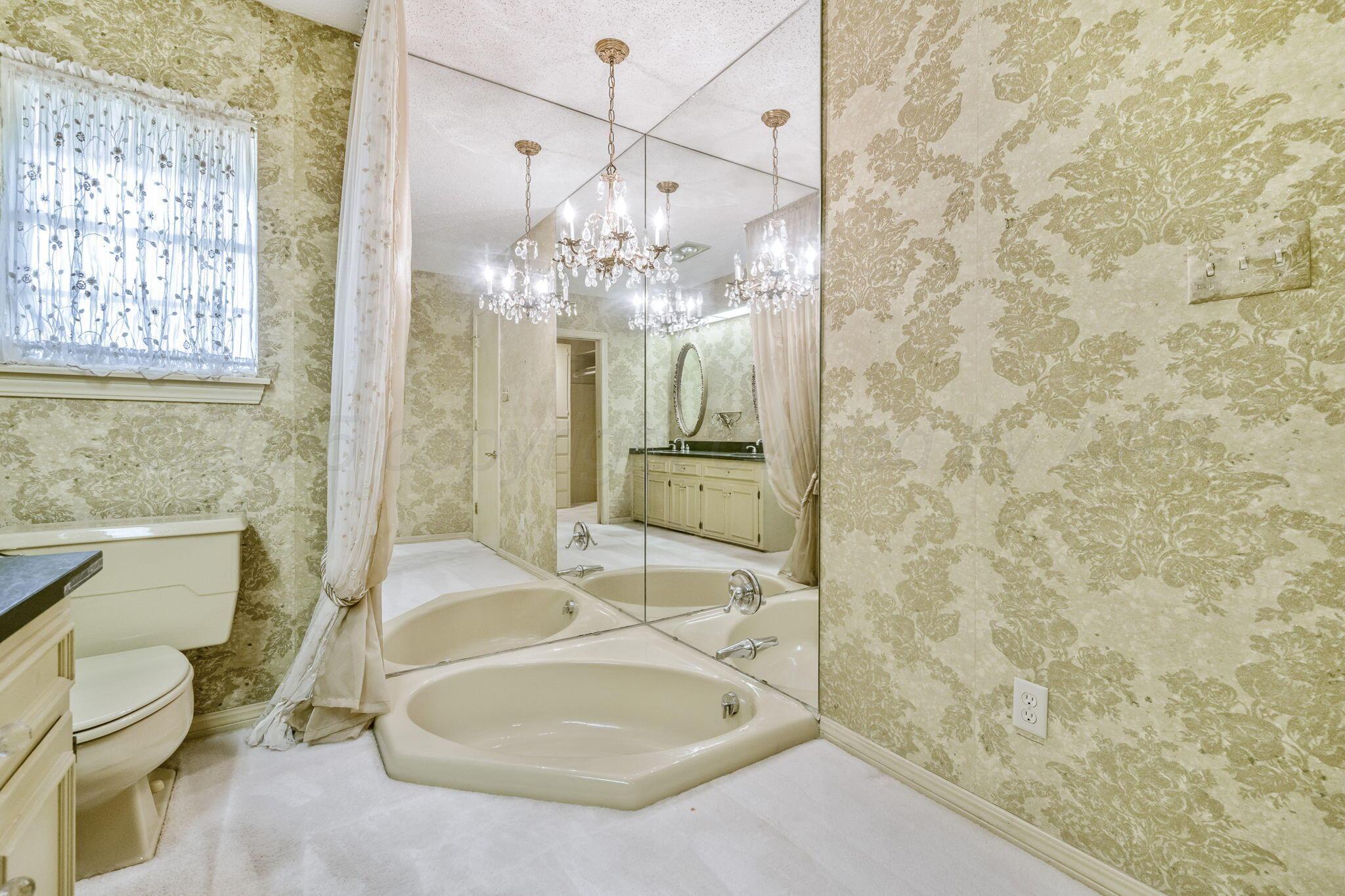 112 Western Street Claude, TX 79019 - Photo 30 of 41 a bathroom with a sink a toilet and shower