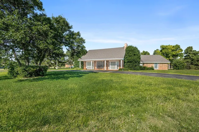a house view with garden space