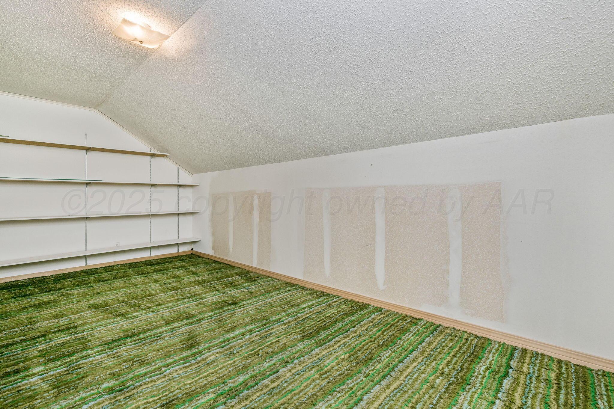 112 Western Street Claude, TX 79019 - Photo 35 of 41 a view of a room with an empty space and wooden floor