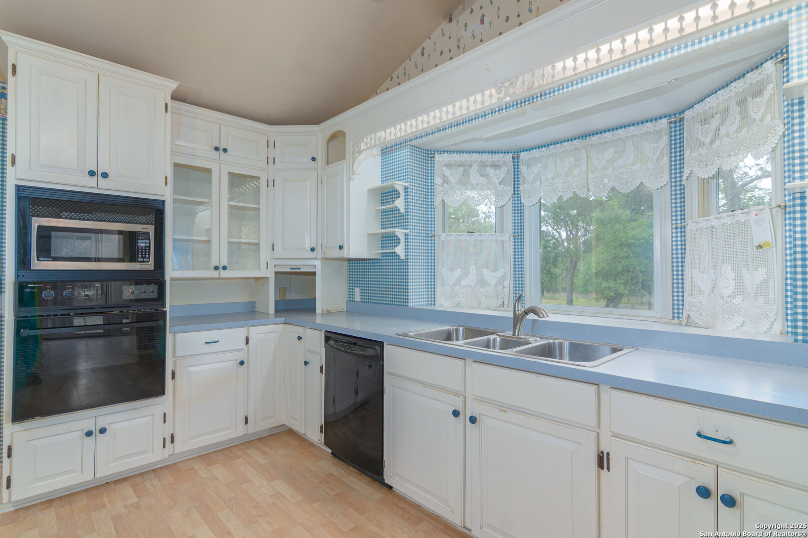 2981 Vivroux Ranch Road Seguin, TX 78155 - Photo 33 of 50 a kitchen with a sink cabinets and window