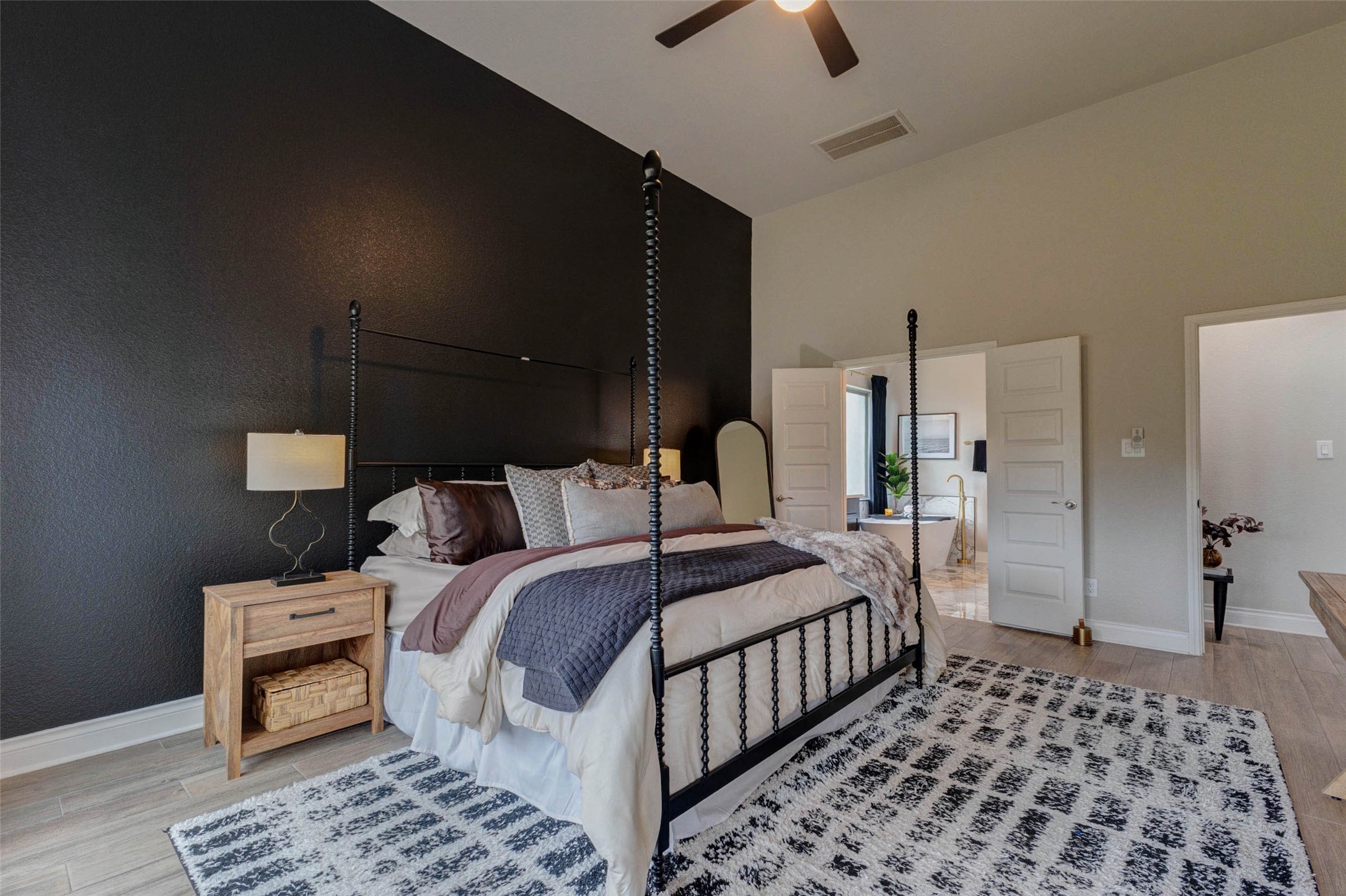 4303 Tupelo Leaf Court Manvel, TX 77578 - Photo 30 of 50 a bedroom with double bed and a lamp