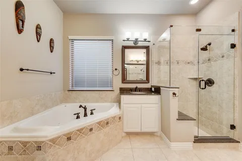 a bathroom with a bathtub and a sink