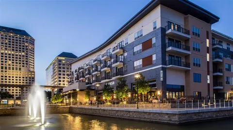 a view of swimming pool with a patio